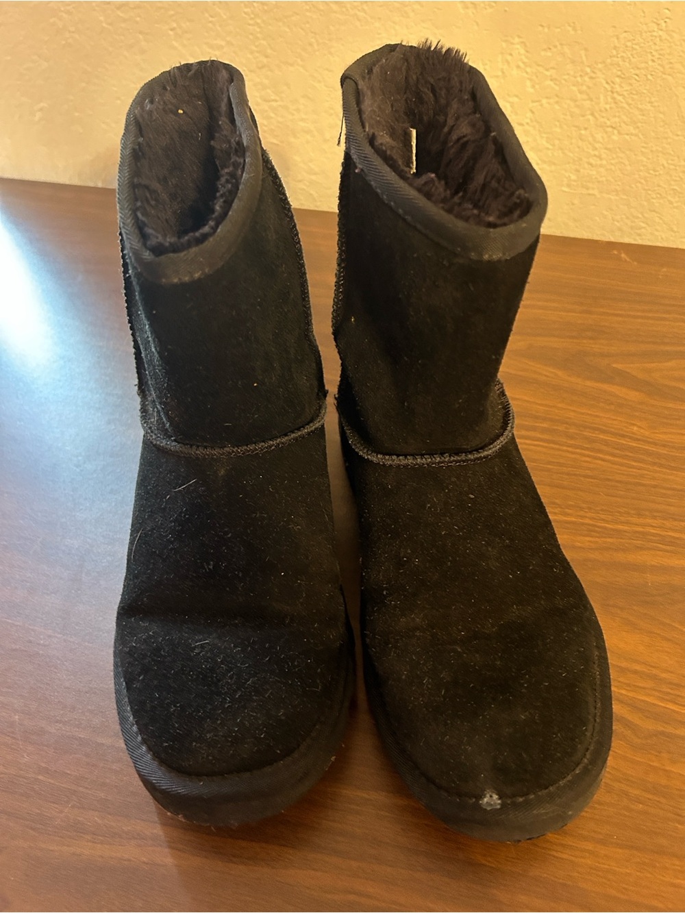 Black suede UGG type boots in 8W.
